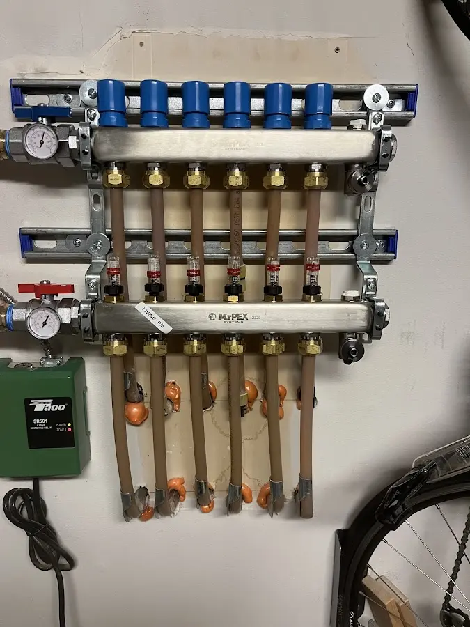 Plumber performing Leak Detection at a residential property in Santa Fe